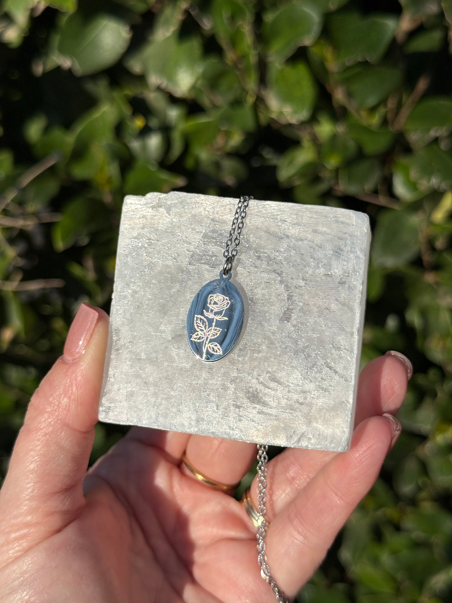Dainty oval engraved necklace — close-up
