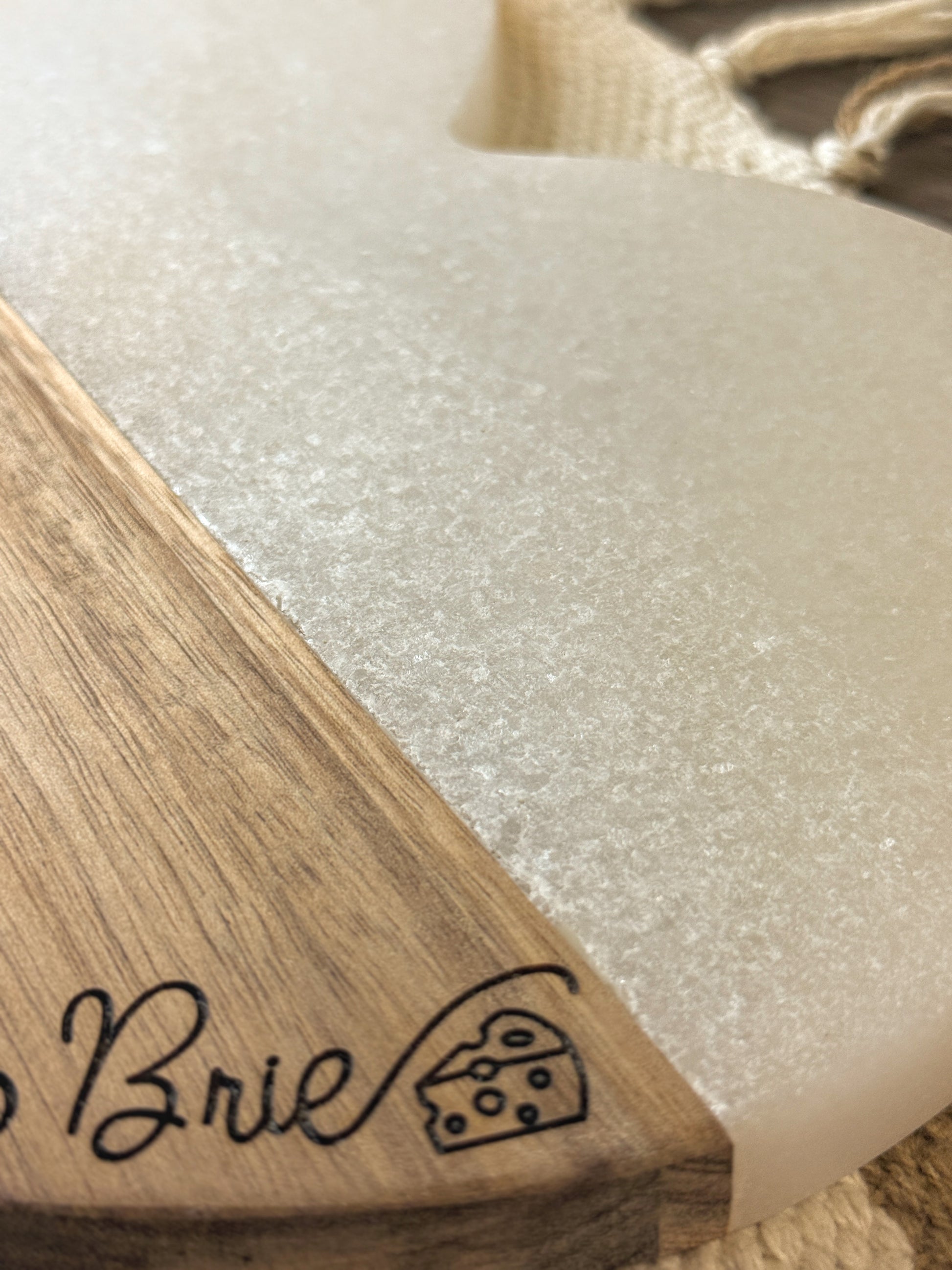 Custom engraved marble cheese board - close-up of script font