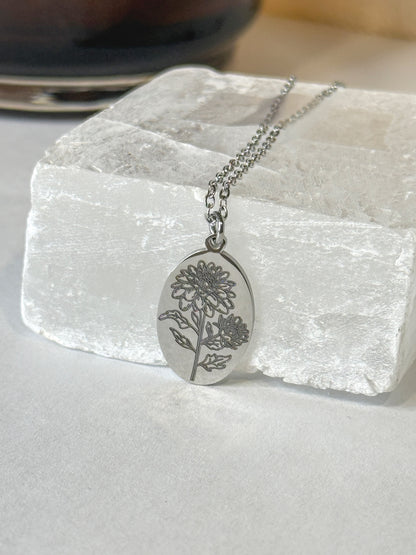 Dainty oval charm necklace engraved with an initial