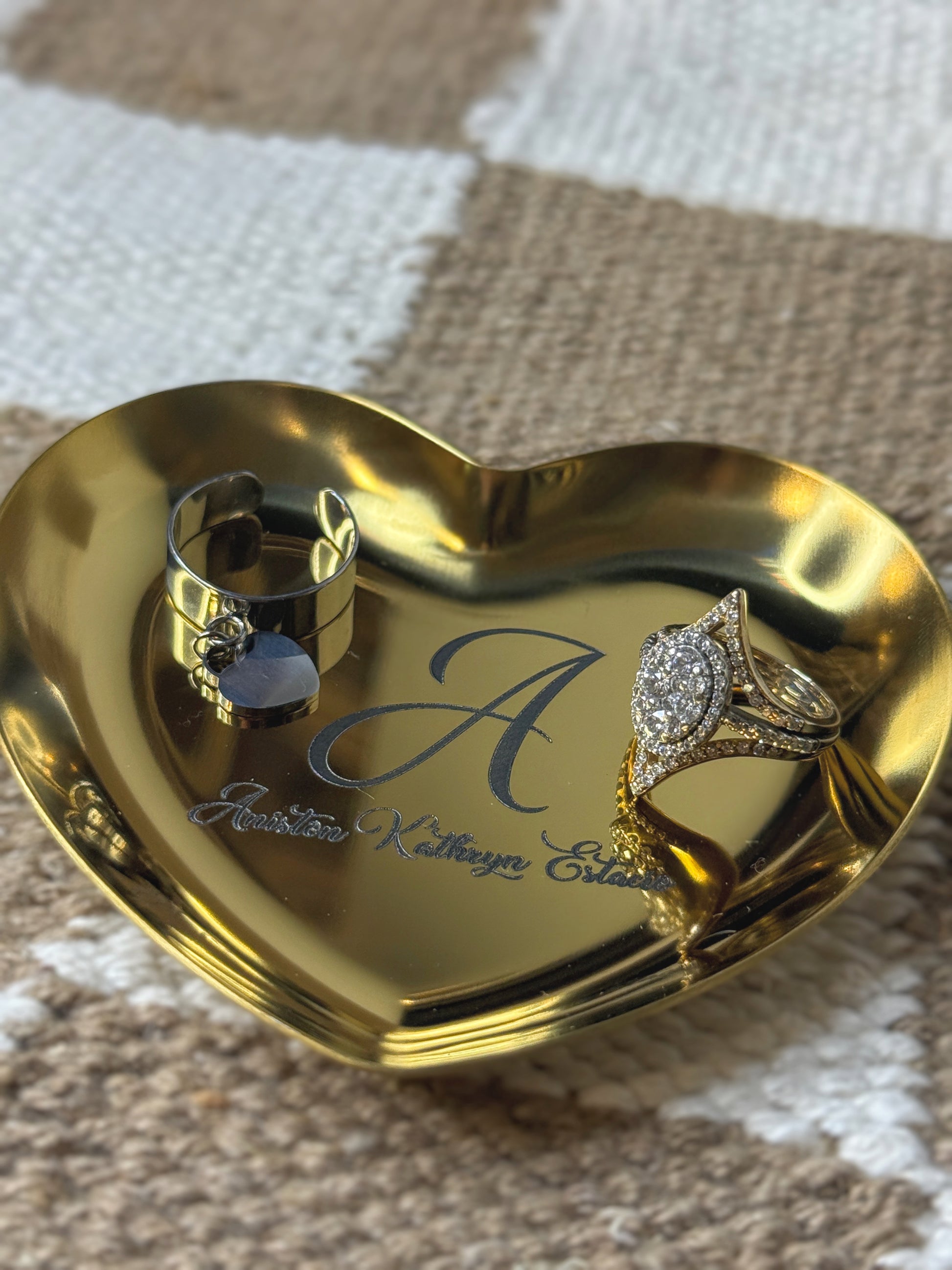 Close-up of laser engraving on heart-shaped stainless steel trinket tray — The Burn Shack, Denair, CA