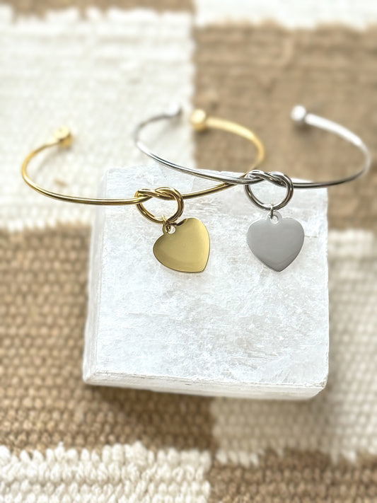 Adjustable heart bolo bracelet on wrist