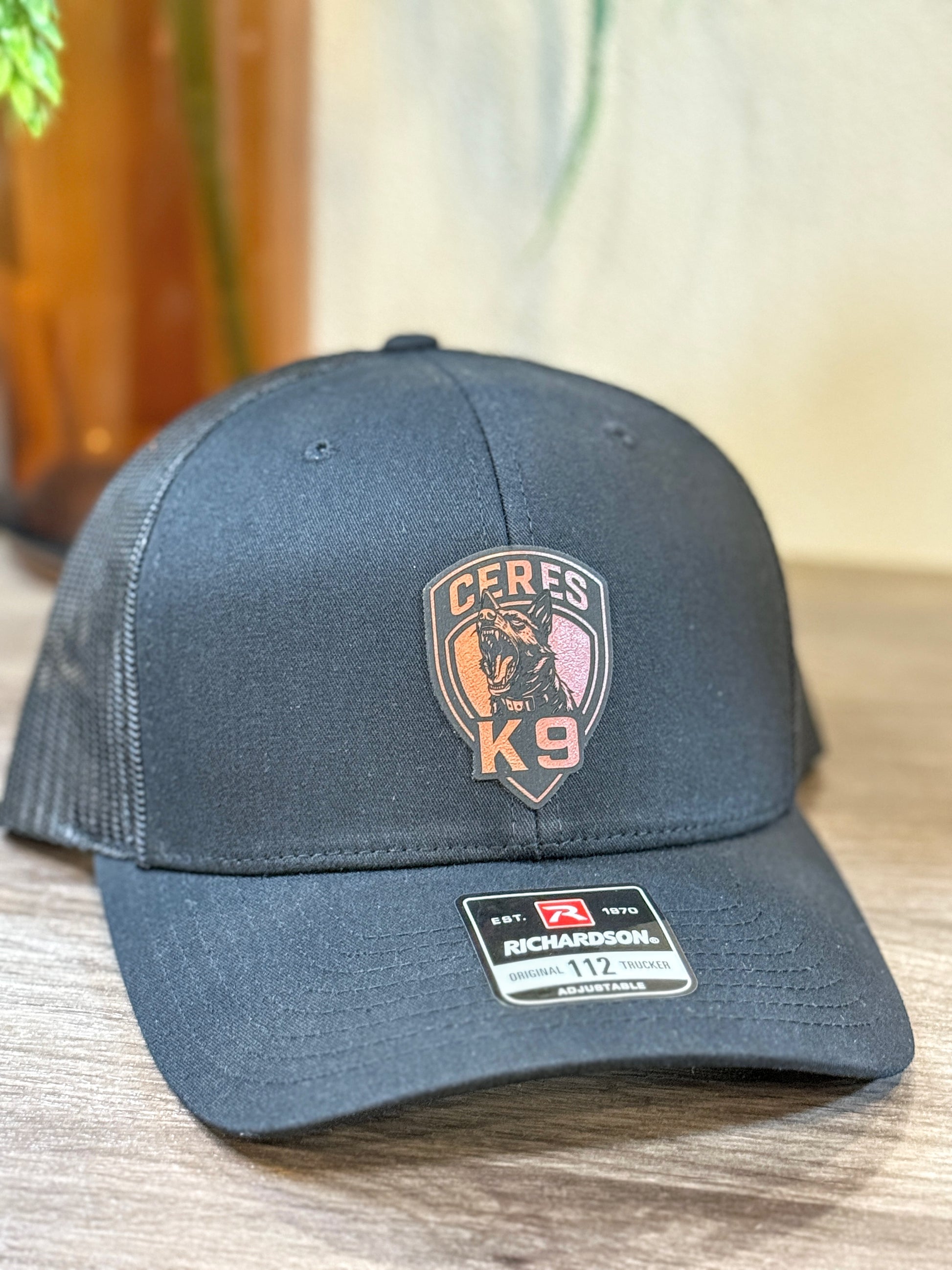 Logo leather patch hat — styled photo